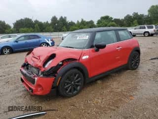 2021 MINI Hardtop Cooper S with VIN WMWXR5C03M2N98038, listed as a Copart auction lot 58202015 with 69,124 mi miles and Salvage title. Bid and sale history available at DreamBid. Image 1.