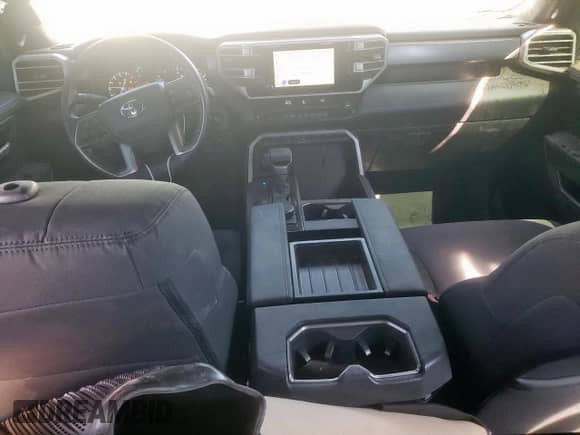 2025 Toyota Tundra SR with VIN 5TFLA5DB4SX257935, listed as a Copart auction lot 57320765 with 6,384 mi miles and Salvage title. Bid and sale history available at DreamBid. Image 8.