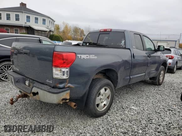 2010 Toyota Tundra with VIN 5TFUY5F1XAX131890, listed as a Copart auction lot 87387645 with Not provided miles and Clean title. Bid and sale history available at DreamBid. Image 3.