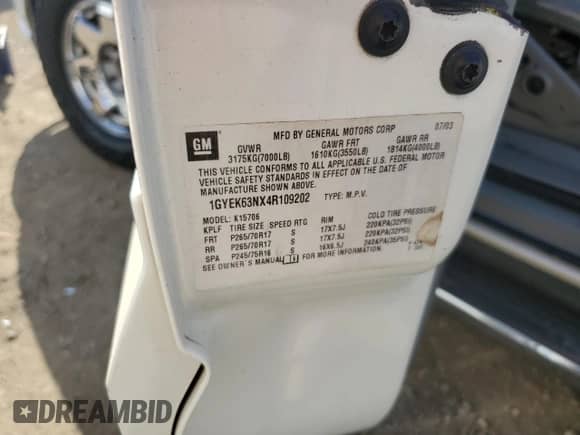 2004 Cadillac Escalade with VIN 1GYEK63NX4R109202, listed as a Copart auction lot 84244305 with Not provided miles and Salvage title. Bid and sale history available at DreamBid. Image 12.