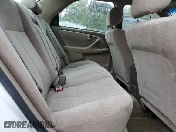 2000 Toyota Camry LE z VIN JT2BG22K4Y0432223, wystawiony jako Copart lot #89737405 z przebiegiem 230 409 mil mil oraz Czysty tytuł • Clean title. Historia ofert i sprzedaży dostępna na DreamBid. Obrazek 10.