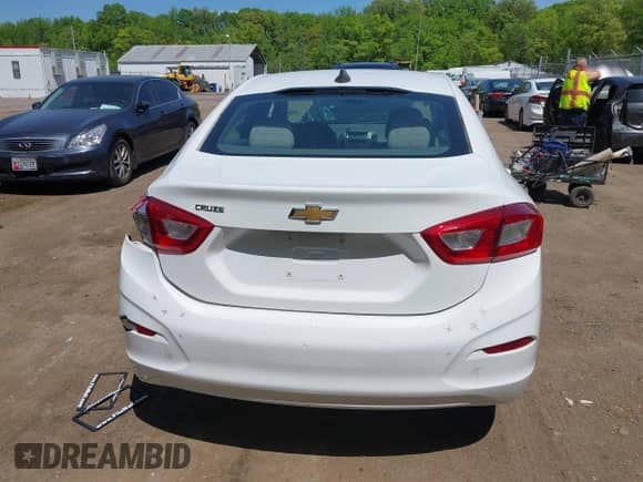 2018 Chevrolet Cruze LS with VIN 1G1BB5SM6J7117261, listed as a IAAI auction lot 42157339 with 146,013 mi miles and . Bid and sale history available at DreamBid. Image 16.