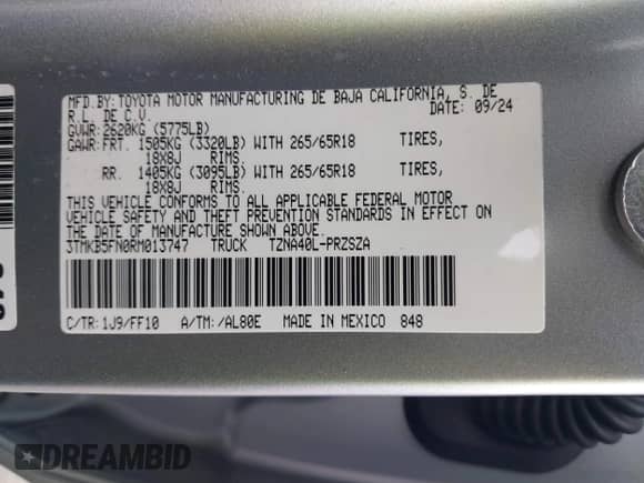 2024 Toyota Tacoma SR5 z VIN 3TMKB5FN0RM013747, wystawiony jako IAAI lot #41411768 z przebiegiem 7 906 mil mil oraz . Historia ofert i sprzedaży dostępna na DreamBid. Obrazek 9.