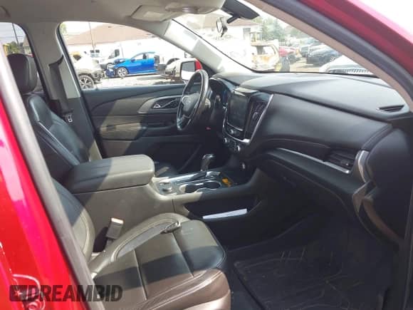 2019 Chevrolet Traverse LT z VIN 1GNEVHKW8KJ141247, wystawiony jako IAAI lot #42872355 z przebiegiem 104 324 mil mil oraz . Historia ofert i sprzedaży dostępna na DreamBid. Obrazek 5.