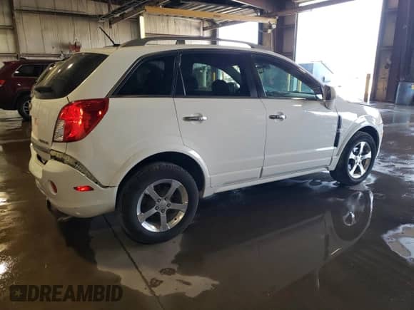 2013 Chevrolet Captiva Sport LT с VIN 3GNAL3EK7DS636475, выставлен на аукционе Copart как лот 70757524 с пробегом 109 857 миль миль и Списание • Salvage title. История ставок и продаж доступна на DreamBid. Изображение 3.