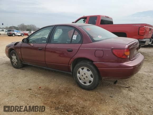 2002 Saturn SL with VIN 1G8ZH52872Z117289, listed as a Copart auction lot 50993815 with Not provided miles and Salvage title. Bid and sale history available at DreamBid. Image 2.