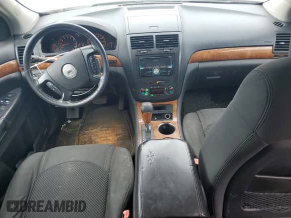 2007 Saturn Outlook XR with VIN 5GZER23787J101418, listed as a Copart auction lot 70452555 with 385,954 mi miles and Salvage title. Bid and sale history available at DreamBid. Image 8.