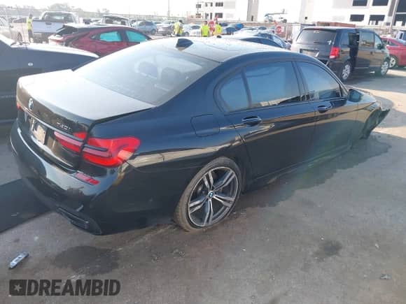 2019 BMW 7 Series 740i with VIN WBA7E2C59KB217750, listed as a IAAI auction lot 42915951 with 95,148 mi miles and . Bid and sale history available at DreamBid. Image 4.
