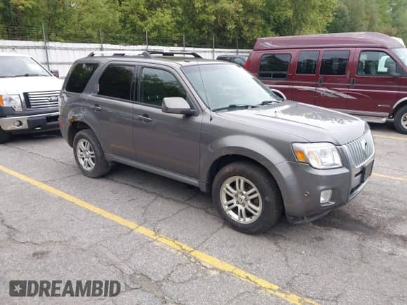 2010 Mercury Mariner Premier with VIN 4M2CN9H70AKJ30462, listed as a IAAI auction lot 43264181 with 169,789 mi miles and . Bid and sale history available at DreamBid. Image 1.