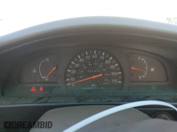 1998 Toyota Tacoma z VIN 4TAPM62N0WZ107452, wystawiony jako Copart lot #55444445 z przebiegiem 300 839 mil mil oraz Szkoda całkowita • Salvage title. Historia ofert i sprzedaży dostępna na DreamBid. Obrazek 9.