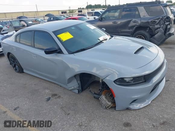 2022 Dodge Charger GT with VIN 2C3CDXHGXNH173883, listed as a IAAI auction lot 43255641 with 36,149 mi miles and . Bid and sale history available at DreamBid. Image 1.