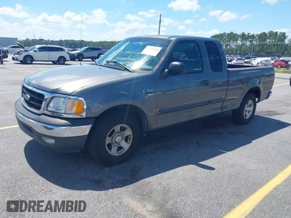 2004 Ford F-150 XL with VIN 2FTRX17W94CA33693, listed as a IAAI auction lot 42522834 with Not provided miles and . Bid and sale history available at DreamBid. Image 2.