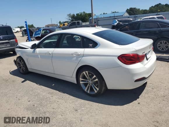 2019 BMW 4 Series 430i xDrive with VIN WBA4J3C50KBL04926, listed as a Copart auction lot 70530825 with 76,541 mi miles and Salvage title. Bid and sale history available at DreamBid. Image 2.
