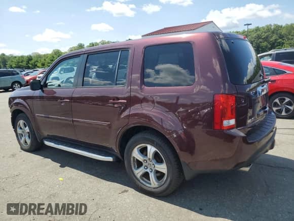 2014 Honda Pilot EX-L with VIN 5FNYF4H71EB055334, listed as a Copart auction lot 65711595 with 95,612 mi miles and Salvage title. Bid and sale history available at DreamBid. Image 2.