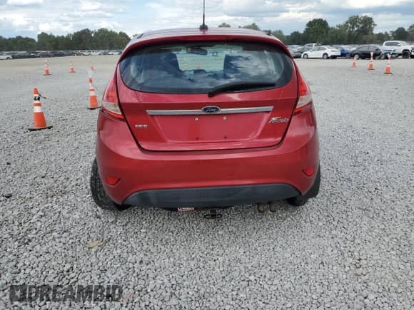 2011 Ford Fiesta SES z VIN 3FADP4FJ7BM104334, wystawiony jako Copart lot #70683695 z przebiegiem 96 056 mil mil oraz Szkoda całkowita • Salvage title. Historia ofert i sprzedaży dostępna na DreamBid. Obrazek 6.