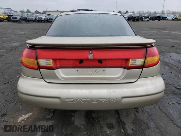 1997 Saturn 2dr Coupe с VIN 1G8ZH1270VZ413209, выставлен на аукционе Copart как лот 50868754 с пробегом 109 177 миль миль и Списание • Salvage title. История ставок и продаж доступна на DreamBid. Изображение 6.