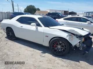 2016 Dodge Challenger SRT 392 with VIN 2C3CDZDJ2GH299591, listed as a IAAI auction lot 43114785 with 52,023 mi miles and . Bid and sale history available at DreamBid. Image 1.