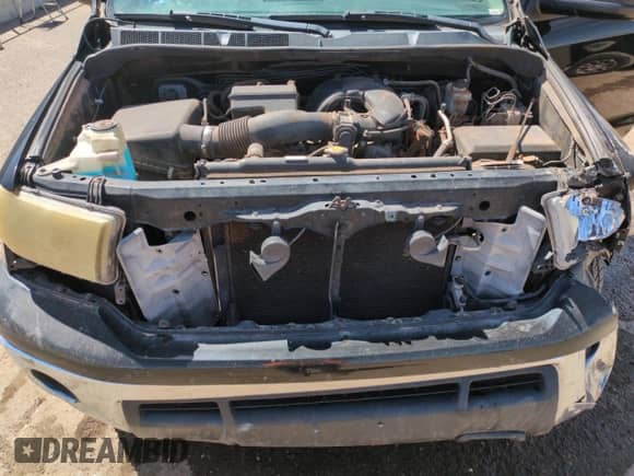 2012 Toyota Tundra z VIN 5TFRU5F10CX028076, wystawiony jako Copart lot #50353735 z przebiegiem 171 321 mil mil oraz Szkoda całkowita • Salvage title. Historia ofert i sprzedaży dostępna na DreamBid. Obrazek 11.
