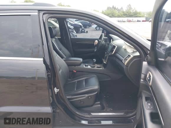 2014 Jeep Grand Cherokee Limited z VIN 1C4RJFBG6EC589188, wystawiony jako IAAI lot #43290881 z przebiegiem 148 318 mil mil oraz . Historia ofert i sprzedaży dostępna na DreamBid. Obrazek 5.