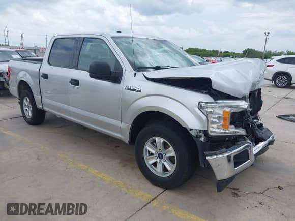 2018 Ford F-150 XL with VIN 1FTEW1CG4JKD86012, listed as a IAAI auction lot 42660823 with 102,978 mi miles and . Bid and sale history available at DreamBid. Image 1.