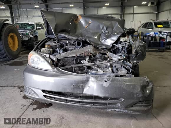 2002 Toyota Camry LE с VIN 4T1BF30K62U530815, выставлен на аукционе Copart как лот 69773535 с пробегом 92 224 миль миль и Списание • Salvage title. История ставок и продаж доступна на DreamBid. Изображение 5.