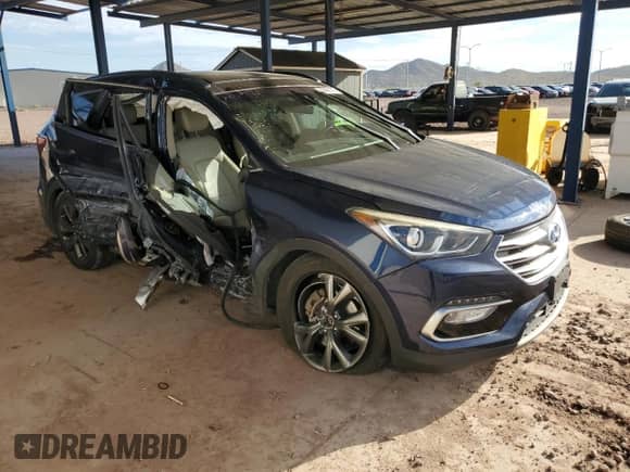 2018 Hyundai Santa Fe Ultimate with VIN 5XYZW4LA7JG563141, listed as a Copart auction lot 69488145 with 70,635 mi miles and Salvage title. Bid and sale history available at DreamBid. Image 4.