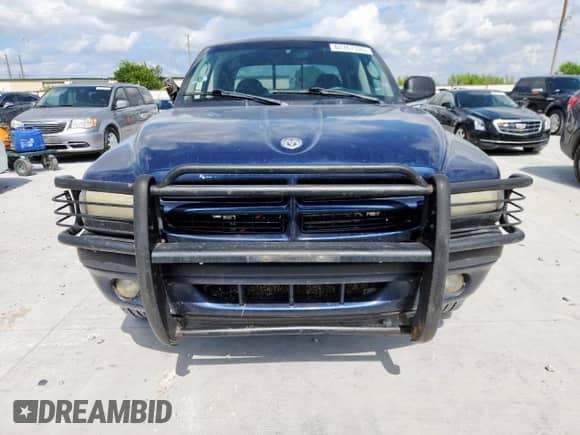 2002 Dodge Dakota Sport z VIN 1B7HL38N62S692851, wystawiony jako Copart lot #63767335 z przebiegiem 218 871 mil mil oraz Szkoda całkowita • Salvage title. Historia ofert i sprzedaży dostępna na DreamBid. Obrazek 5.