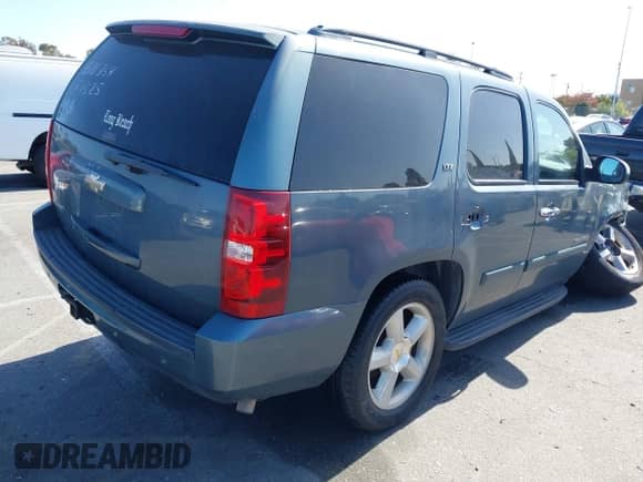 2008 Chevrolet Tahoe LTZ with VIN 1GNFC13JX8J216303, listed as a IAAI auction lot 42287728 with 152,012 mi miles and . Bid and sale history available at DreamBid. Image 4.