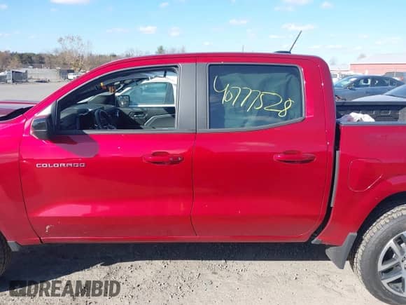 2023 Chevrolet Colorado 4WD Z71 with VIN 1GCPTDEKXP1210133, listed as a IAAI auction lot 40777528 with 21,464 mi miles and . Bid and sale history available at DreamBid. Image 14.