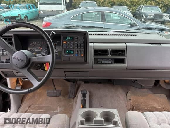 1994 GMC Sierra 1500 with VIN 2GTEK19K4R1579845, listed as a Copart auction lot 89894485 with 148,811 mi miles and Clean title. Bid and sale history available at DreamBid. Image 9.