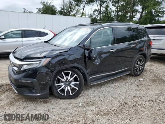 2020 Honda Pilot Elite с VIN 5FNYF6H01LB057984, выставлен на аукционе Copart как лот 69774845 с пробегом 81 858 миль миль и Списание • Salvage title. История ставок и продаж доступна на DreamBid. Изображение 1.