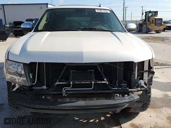 2013 Chevrolet Tahoe LTZ с VIN 1GNSCCE05DR185620, выставлен на аукционе Copart как лот 61861265 с пробегом 191 080 миль миль и Списание • Salvage title. История ставок и продаж доступна на DreamBid. Изображение 15.