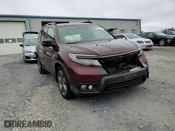 2019 Honda Passport Touring with VIN 5FNYF7H92KB000356, listed as a Copart auction lot 69598615 with 27,658 mi miles and Salvage title. Bid and sale history available at DreamBid. Image 14.