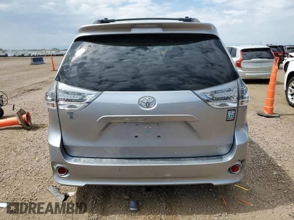 2014 Toyota Sienna SE with VIN 5TDXK3DC0ES412437, listed as a Copart auction lot 70558525 with 145,488 mi miles and Salvage title. Bid and sale history available at DreamBid. Image 6.