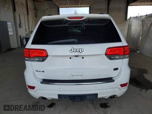 2018 Jeep Grand Cherokee High Altitude z VIN 1C4RJFCGXJC267937, wystawiony jako Copart lot #67016995 z przebiegiem 140 809 mil mil oraz Szkoda całkowita • Salvage title. Historia ofert i sprzedaży dostępna na DreamBid. Obrazek 6.