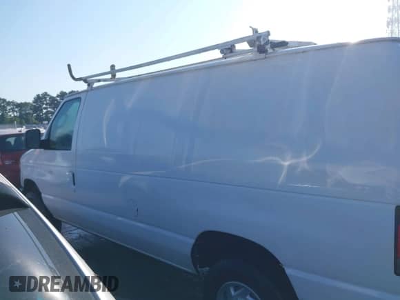 2014 Ford Econoline Cargo Commercial with VIN 1FTSE3EL9EDA49034, listed as a IAAI auction lot 42679719 with 217,659 mi miles and . Bid and sale history available at DreamBid. Image 14.