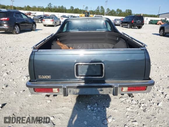 1985 Chevrolet El Camino с VIN 3GCCW80H2FS905566, выставлен на аукционе Copart как лот 75897944 с пробегом 81 485 миль миль и Списание • Salvage title. История ставок и продаж доступна на DreamBid. Изображение 6.