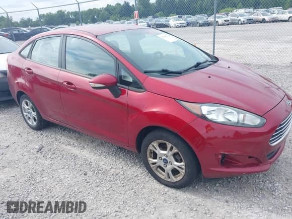 2014 Ford Fiesta SE z VIN 3FADP4BJXEM132171, wystawiony jako IAAI lot #42910603 z przebiegiem 159 580 mil mil oraz . Historia ofert i sprzedaży dostępna na DreamBid. Obrazek 1.