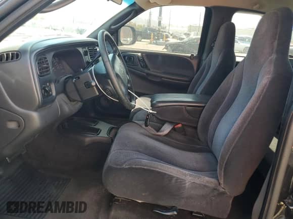 2000 Dodge Dakota Sport with VIN 1B7GL22N7YS516611, listed as a Copart auction lot 82144175 with 173,588 mi miles and Salvage title. Bid and sale history available at DreamBid. Image 7.