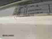 2004 Ford Econoline Cargo with VIN 1FTNS24WX4HA92137, listed as a IAAI auction lot 42888080 with 158,035 mi miles and . Bid and sale history available at DreamBid. Image 9.