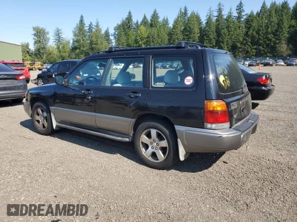 1998 Subaru Forester S with VIN JF1SF6553WH756100, listed as a Copart auction lot 66176565 with Not provided miles and Salvage title. Bid and sale history available at DreamBid. Image 2.