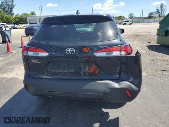 2022 Toyota Corolla Cross L with VIN 7MUAAAAG5NV004462, listed as a Copart auction lot 84825705 with 63,074 mi miles and Salvage title. Bid and sale history available at DreamBid. Image 6.