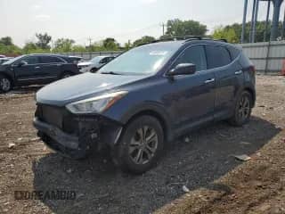 2014 Hyundai Santa Fe with VIN 5XYZU3LB0EG186859, listed as a Copart auction lot 60668615 with 228,647 mi miles and Salvage title. Bid and sale history available at DreamBid. Image 1.