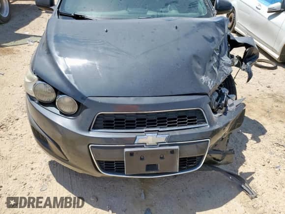 2014 Chevrolet Sonic LT с VIN 1G1JC5SHXE4243836, выставлен на аукционе Copart как лот 70467955 с пробегом 107 855 миль миль и Списание • Salvage title. История ставок и продаж доступна на DreamBid. Изображение 11.