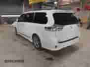 2014 Toyota Sienna SE with VIN 5TDXK3DC7ES497390, listed as a IAAI auction lot 42037096 with 169,127 mi miles and . Bid and sale history available at DreamBid. Image 3.