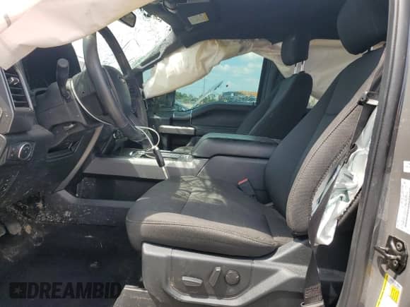 2020 Ford F-150 XL with VIN 1FTEW1EP9LFC64870, listed as a Copart auction lot 63343945 with 102,024 mi miles and Salvage title. Bid and sale history available at DreamBid. Image 7.