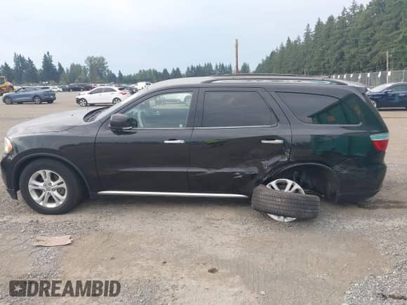 2013 Dodge Durango Crew with VIN 1C4RDJDG5DC700769, listed as a IAAI auction lot 43089347 with 79,946 mi miles and . Bid and sale history available at DreamBid. Image 14.