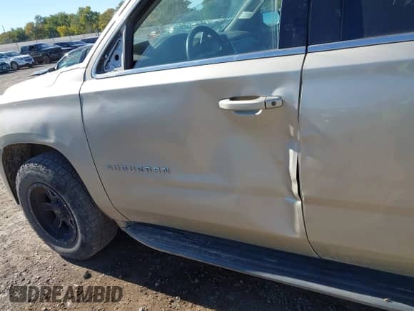 2015 Chevrolet Suburban with VIN 1GNSK5EC1FR682675, listed as a IAAI auction lot 43283608 with 203,132 mi miles and . Bid and sale history available at DreamBid. Image 17.