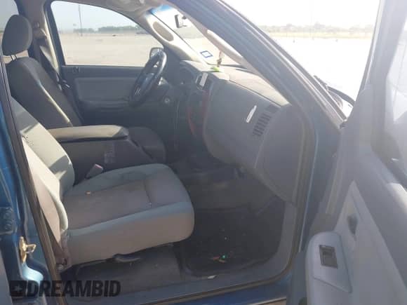 2005 Dodge Dakota SLT with VIN 1D7HE48N25S165061, listed as a IAAI auction lot 42854817 with 225,606 mi miles and . Bid and sale history available at DreamBid. Image 5.