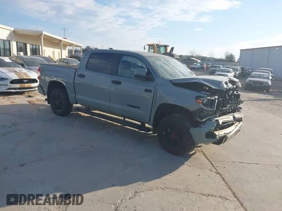 2021 Toyota Tundra SR5 with VIN 5TFDY5F14MX046533, listed as a IAAI auction lot 41663194 with 55,758 mi miles and . Bid and sale history available at DreamBid. Image 1.